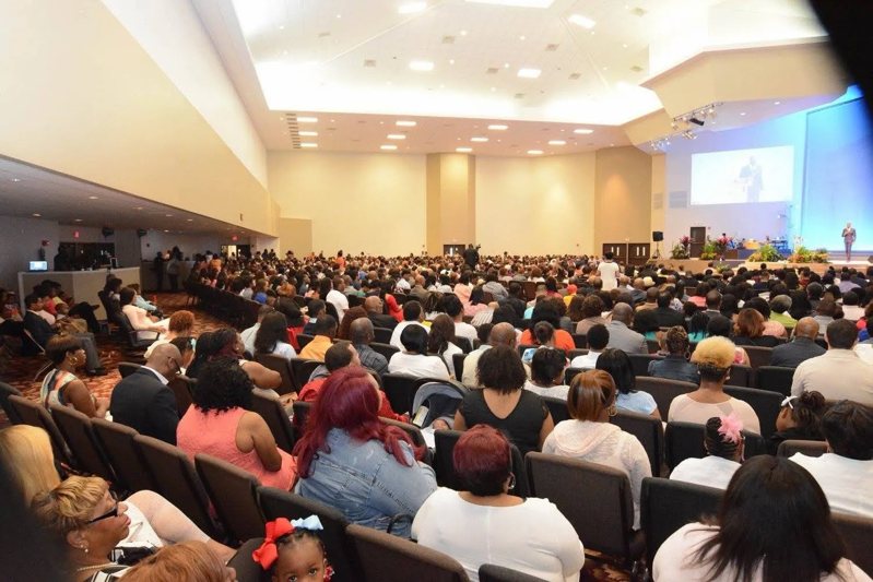 The congregation gathered in a school auditorium, 2009 to 2014